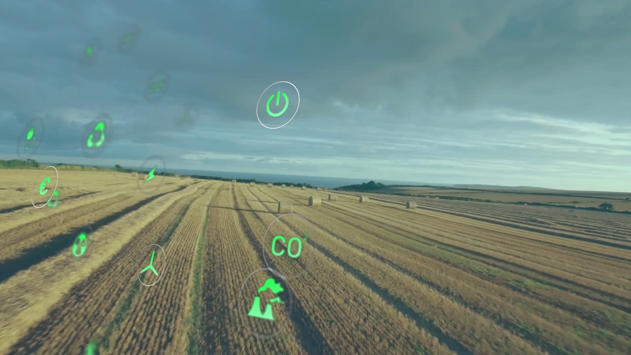 Harvested field showing green icons overhead, highlighting hay bales in flat design