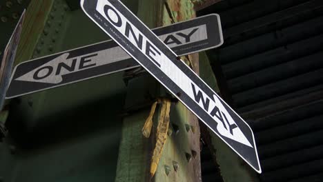 One-Way-Sign,-Brooklyn-New,-York-City,-4K-60P-Daytime,-under-highway,-Close-up