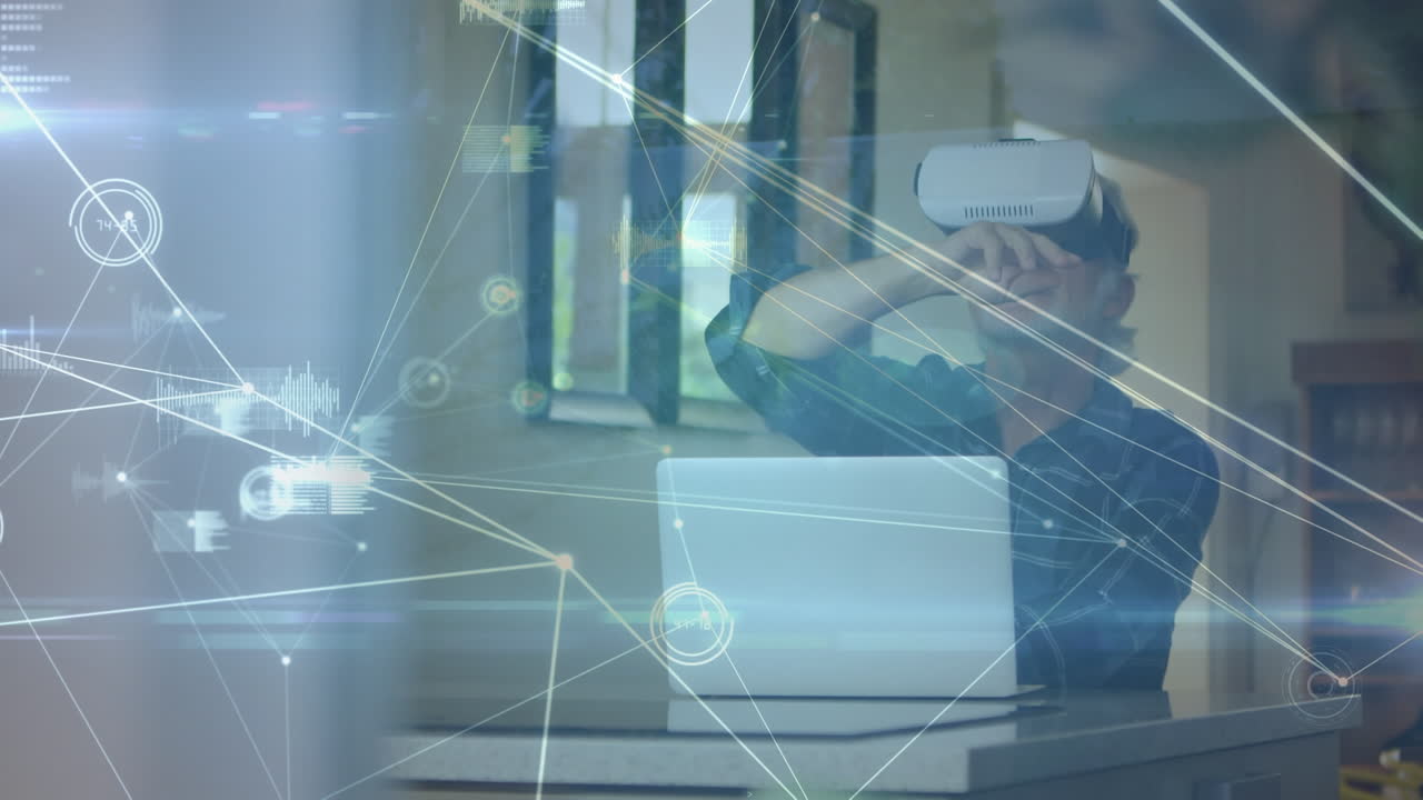 Animation of network of connections over caucasian businessman wearing vr headset