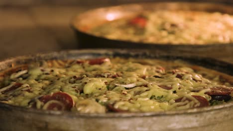 pizza cooking in pizza oven