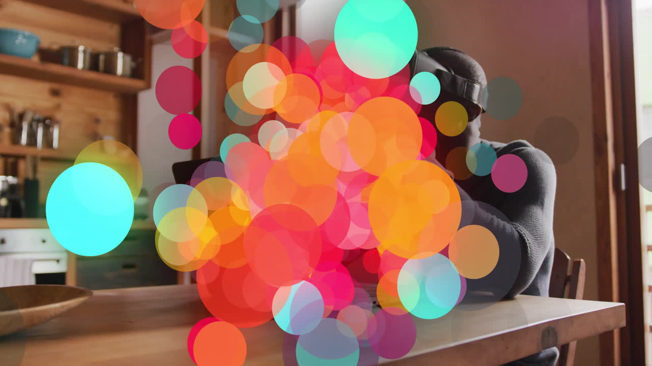 Colorful translucent circles overlapping creating vibrant abstract animation indoors