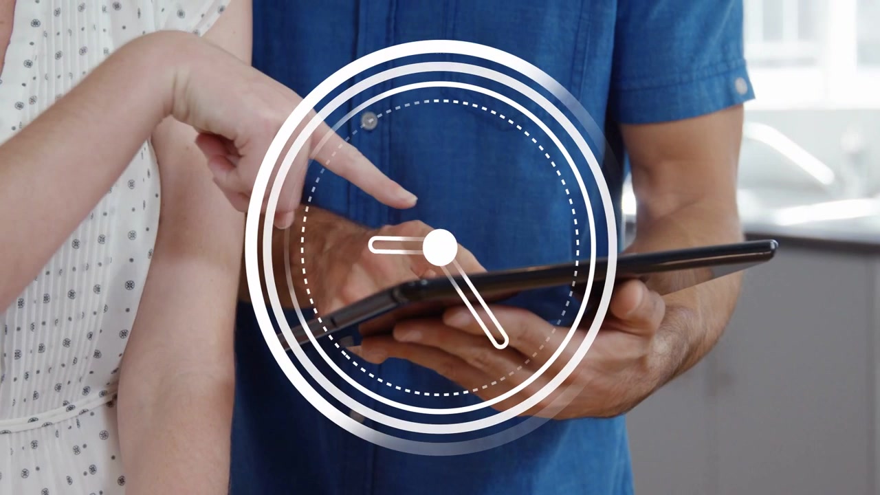Pair with tablet in kitchen man tapping starting clock overlay rotating she testing headphones tech