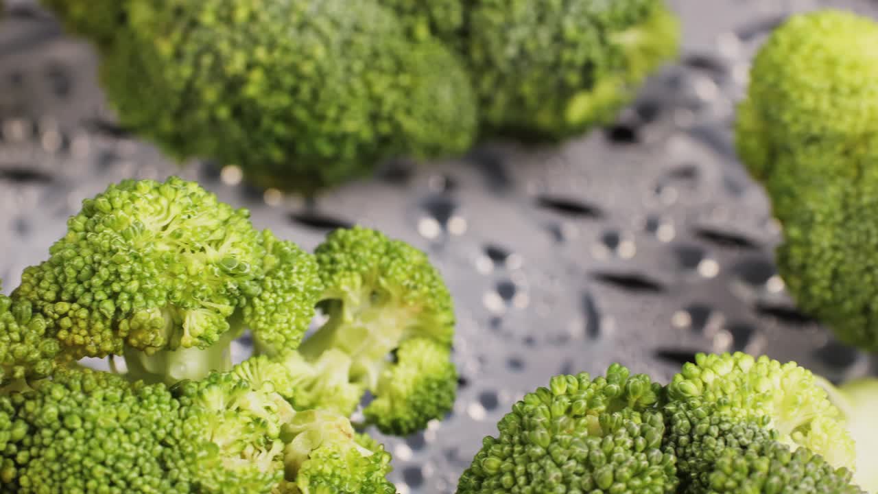 Mixed vegetables, carrots, broccoli, and cauliflower in a food double boiler steamer basket in a stainless steel pot, healthy diet cooking method preserving minerals, vitamins and flavor