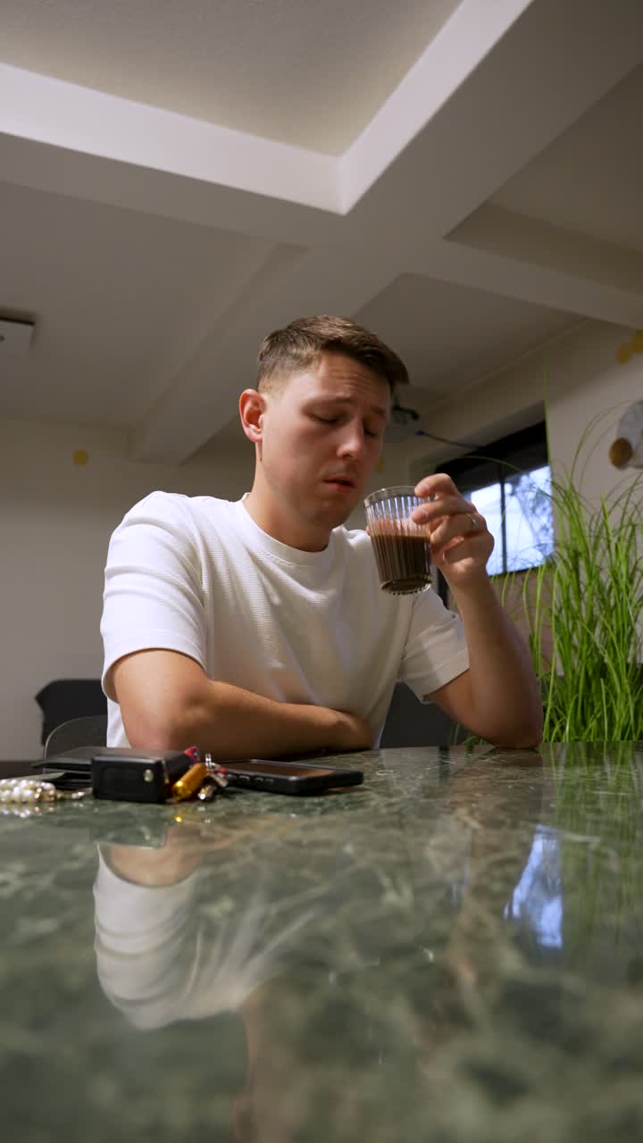 Man Disgusted By Burnt Coffee Smell - Freshly Brewed Coffee With Bitter Taste. - vertical shot