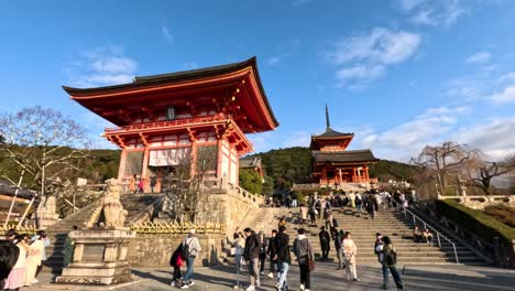 crowds exploring a historic japanese shrine complex