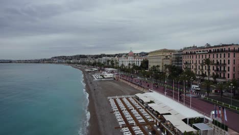 Mediterranean-Touristic-Beach-Coastline-of-Nice,-France-in-Summer---Aerial-Drone