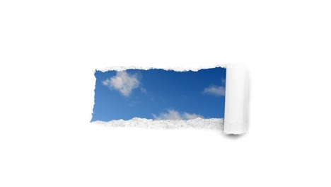 creative 4k time laps video of fast moving clouds in the blue sky that are visible through a hole with torn edges in white paper. the concept of opportunities, a happy future.