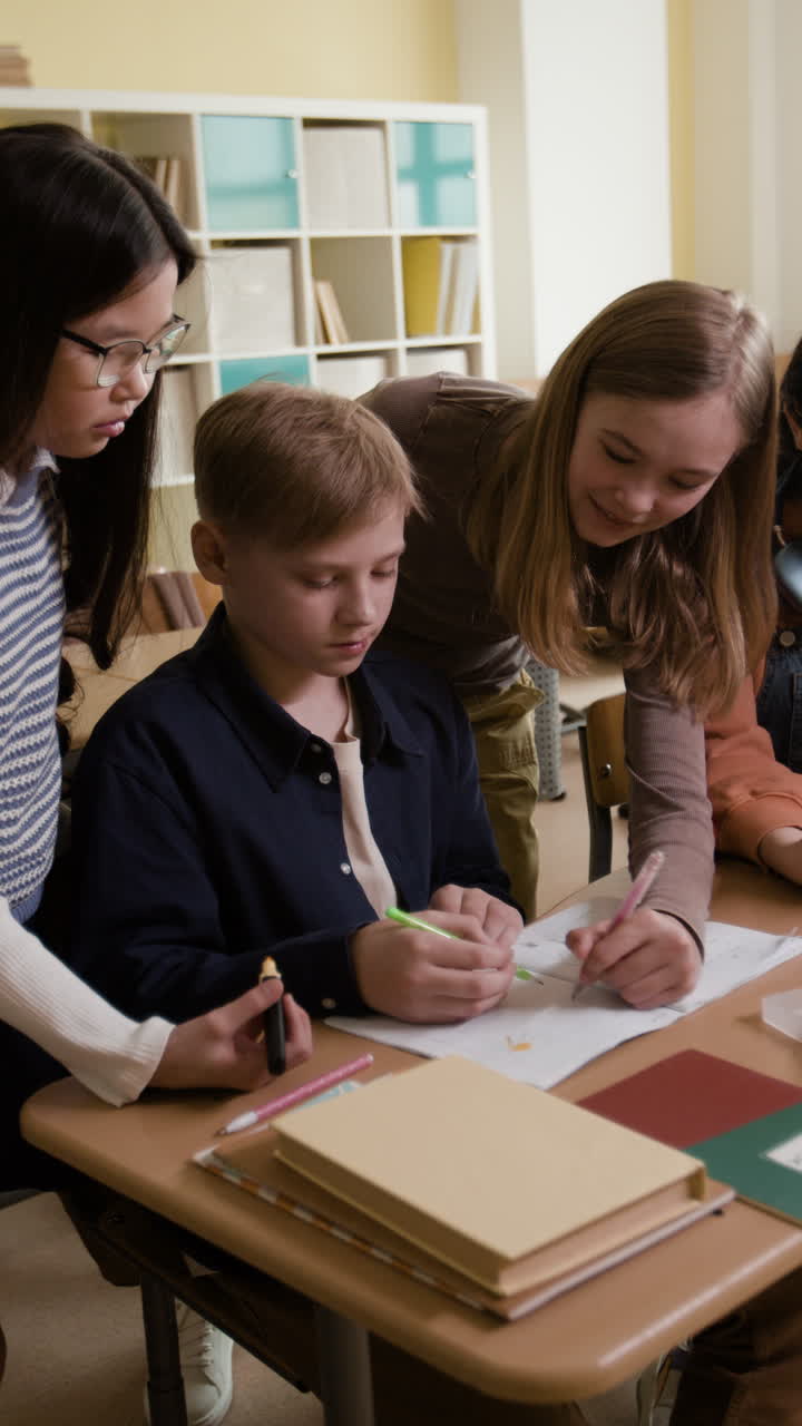 Students collaborating on schoolwork in a classroom