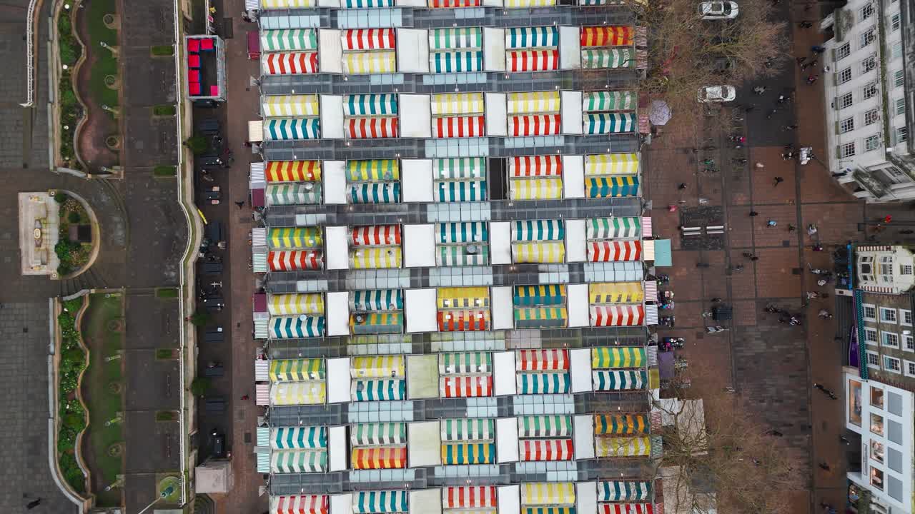 Colorful market stalls in Norwich, Norfolk, viewed from above, vibrant and lively scene