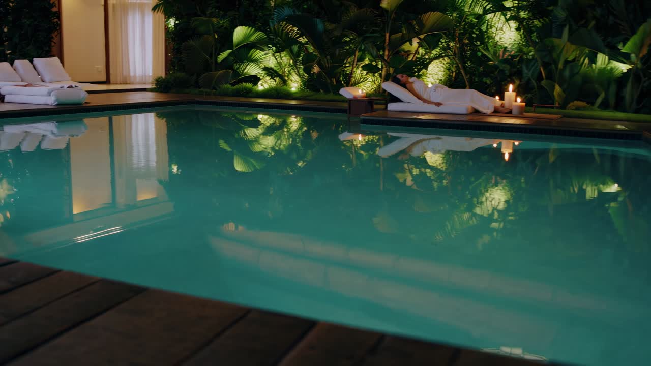 Woman Relaxing Poolside at Spa