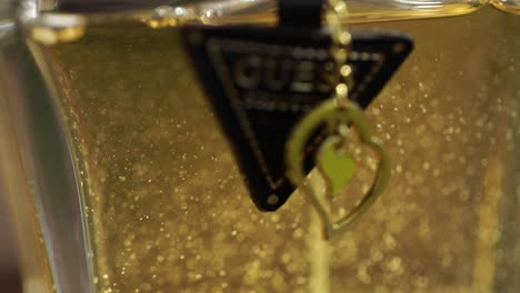 Perfume-Guess-brand-on-a-wooden-table-closeup-shot