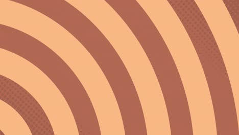 circles forming in hypnotic motion against orange background