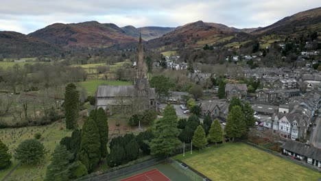 aerial footage of ambleside the lakeland town and former civil parish, now in the parish of lakes, in cumbria, in north west england 2023