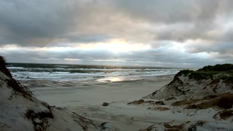 sandy beach with waves, north sea, jütland, sondervig, denmark, 4k