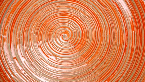 spiral abstract red or brown background, clay dish.