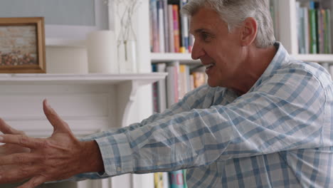 cute-little-girl-hugging-grandfather-playfully-jumping-into-grandad's-arms-having-fun-enjoying-weekend-with-grandparent-at-home