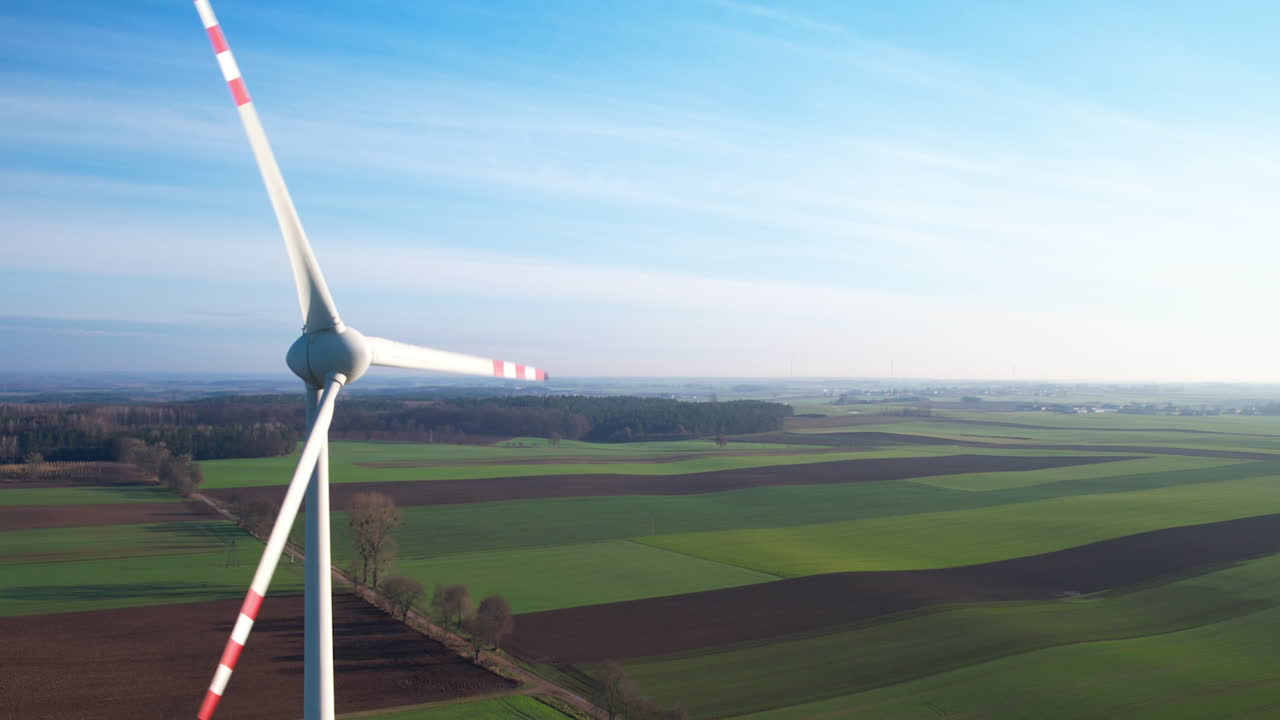 Revealing Aerial One Wind Turbine at Subset - Close-up with Copy Space For Text