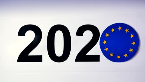 illustration, new year, male hand put on the table on european union flag, country ball, 2020