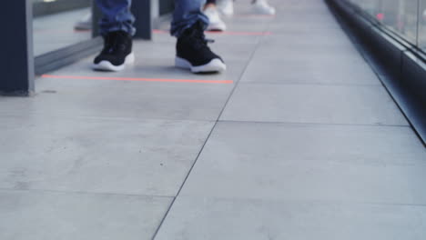 a-group-of-people-standing-in-line-during