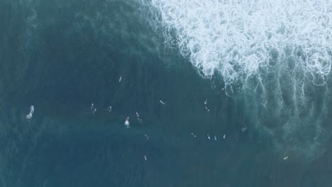 Aerial-Top-Down-Drone-view-of-surfers-at-La-Bocana-El-Tunco-El-Salvador