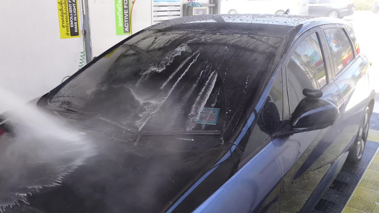 Car being washed at a self-service car wash