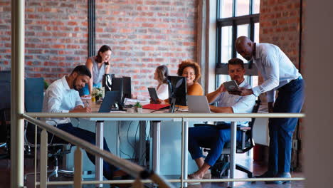 business team working together in busy multi-cultural office