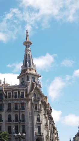 vertical pan argentina buenos aires city streets with el molino patisserie famous architecture in summer daylight skyline