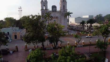 Aerial-Shot-of-a-Colonial-Cathedral-in-Valladolid-Mexico-on-a-Misty-Morning