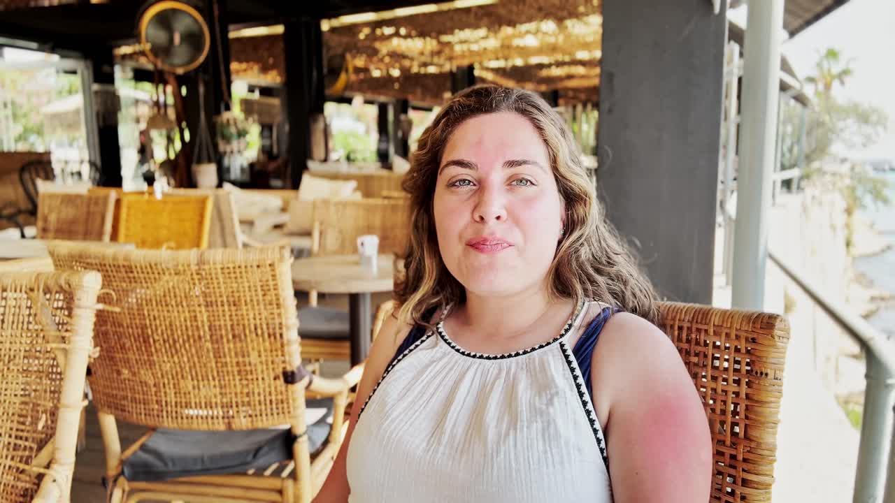 Piraeus Cafe Vibe: Stylish Tourist Relaxes by Yachts