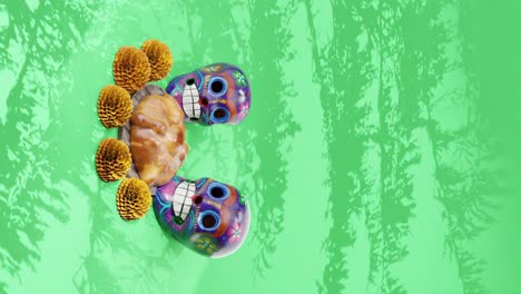 day of the dead celebration vertical animation pan de muerto, green background