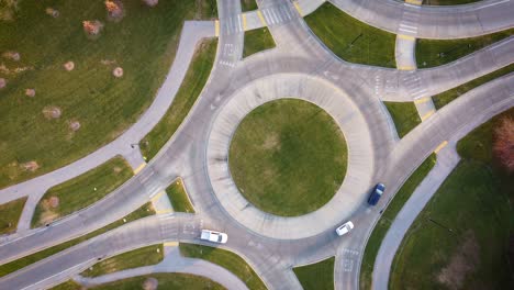 aerial view of early morning roundabout with scarce traffic during late autumn in lexington, kentucky