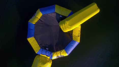aerial view of a floating inflatable water trampoline