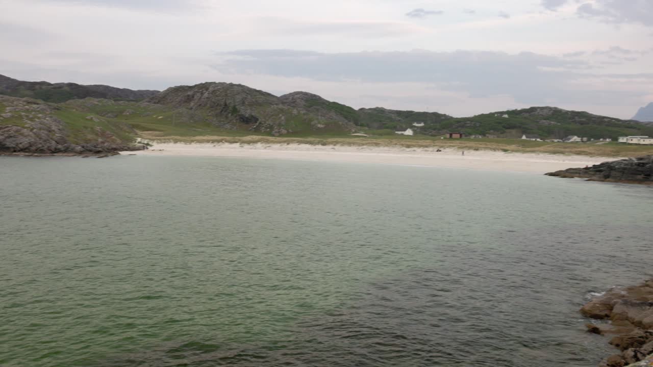 revealing the beautiful Achmelvich Bay with tropical ocean water in the Highlands