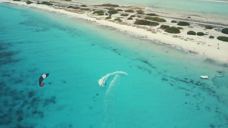 kitesurfing in bonaire in a wonderful blue colored water