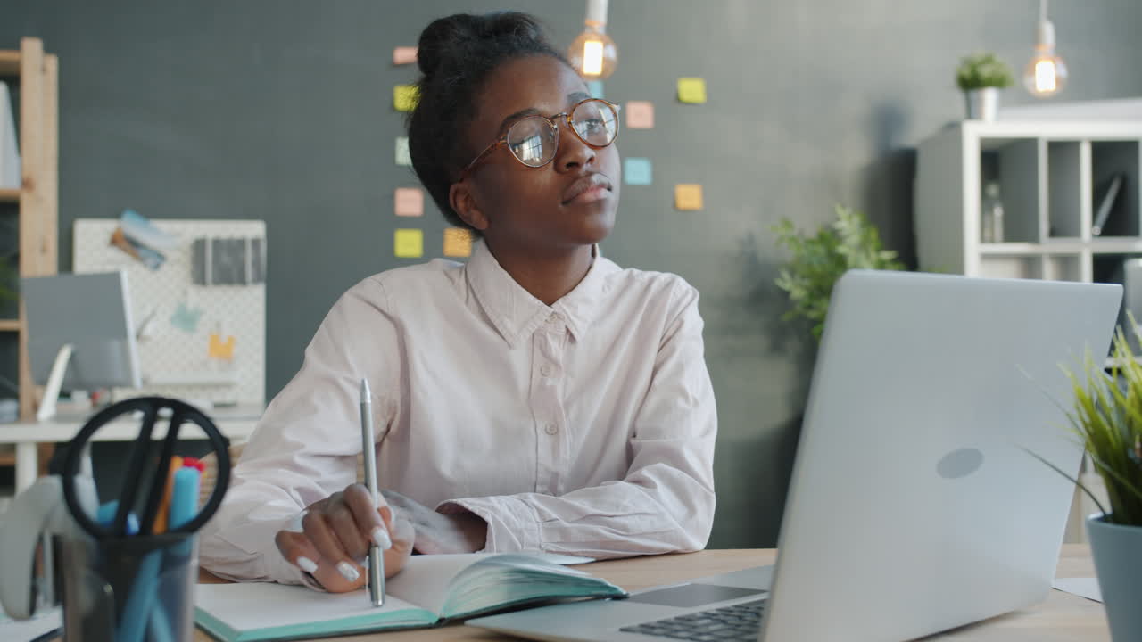 Young Woman Working at a Desk