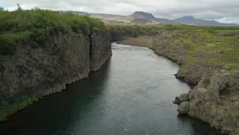 Icelandic River Canyon with Waterfall