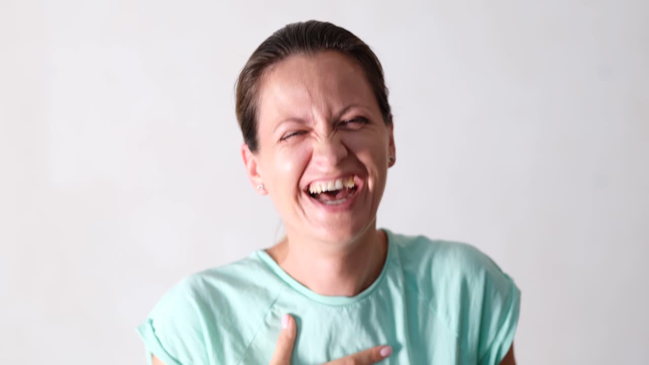Portraits of a laughing woman