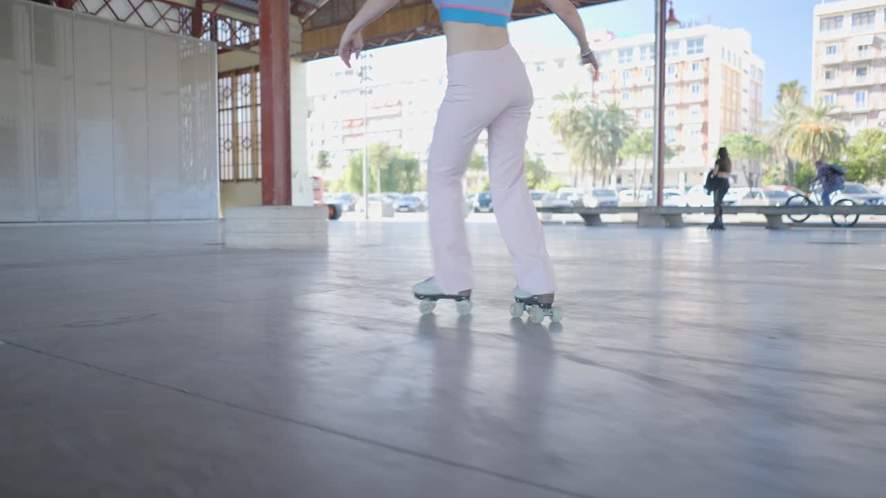 Woman Roller Skating in a City Park