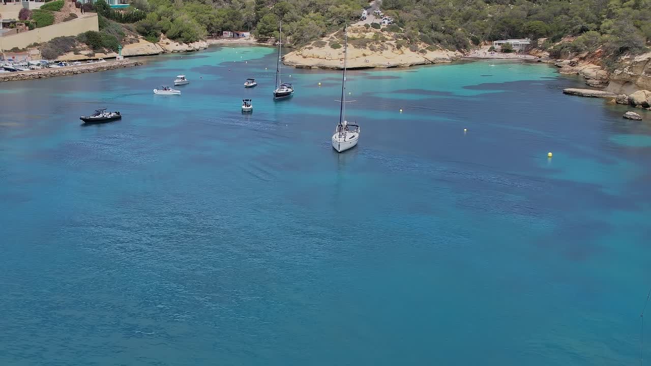 Aerial view of boats in clear water near Mallorca, Spain