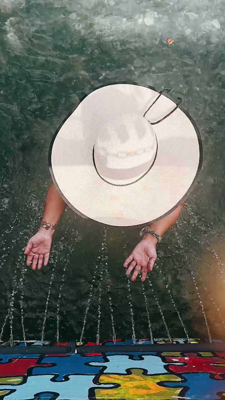 Woman enjoying a fountain