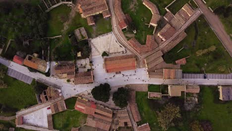 aerial top down view of tratalias townscape rooftops in south sardinia, italy