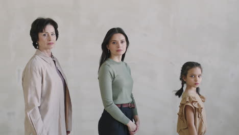 three generations of women showing girl power