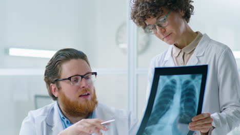 two doctors discussing chest x ray