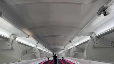 Cabin-view-from-the-rear-of-a-medium-size-jet-during-the-cleaning-in-a-stop-over