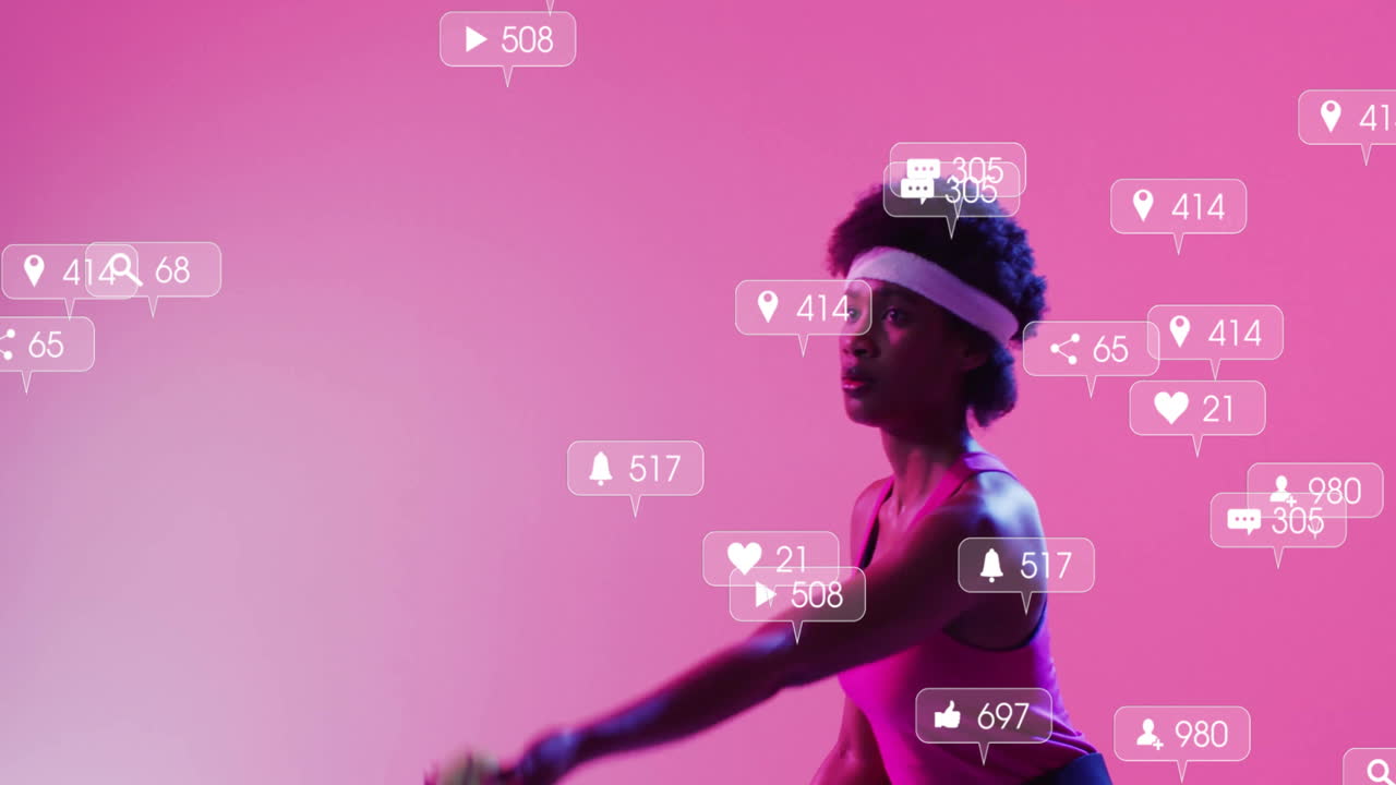 Woman tossing tennis ball in pink studio, showcasing floating social media marketing icons