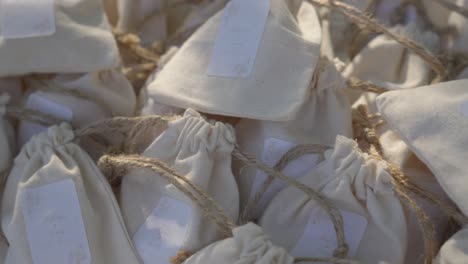 wedding gifts in small bags at ceremonial party.