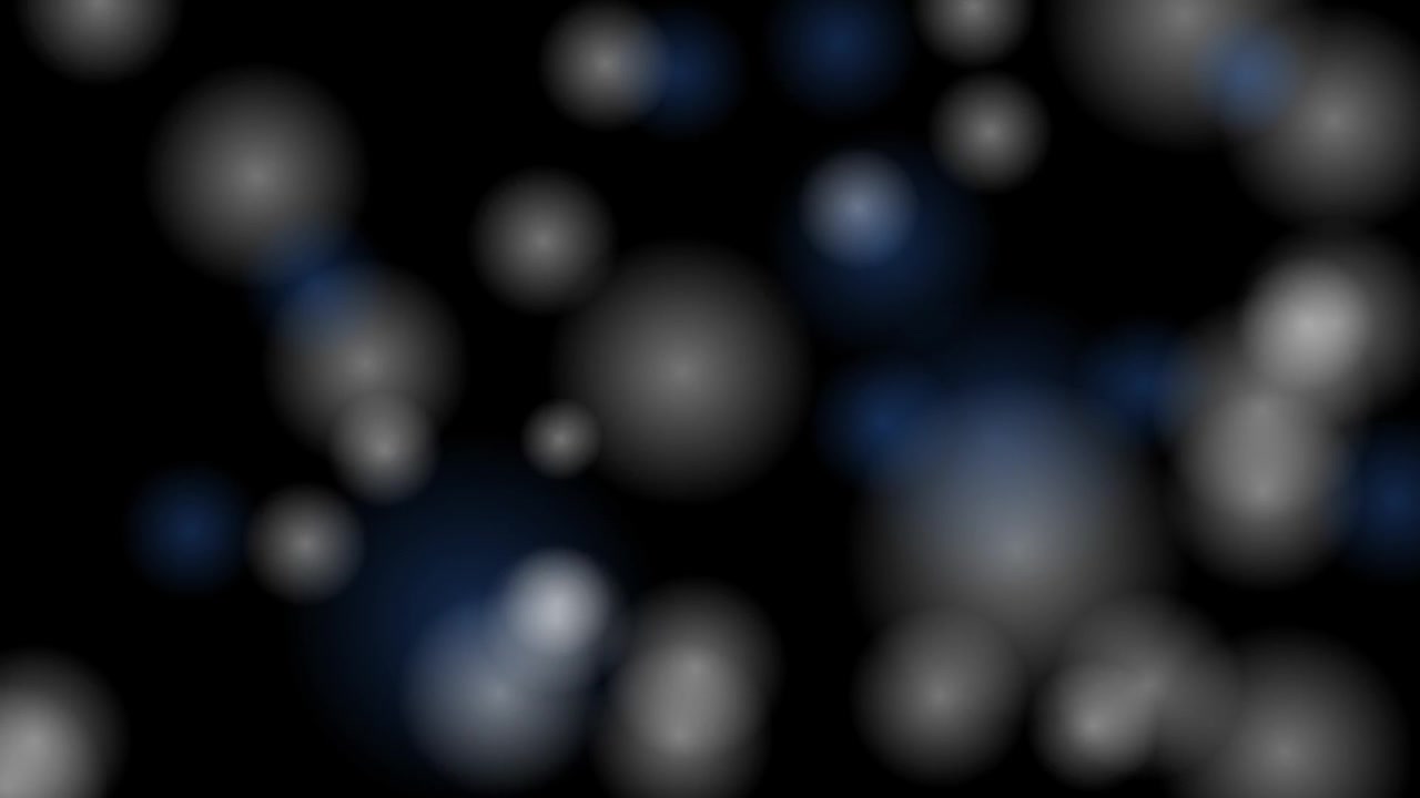 Abstract Background of Floating Soft White Bokeh Lights