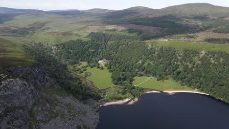 mountain view with a river flowing into a lake