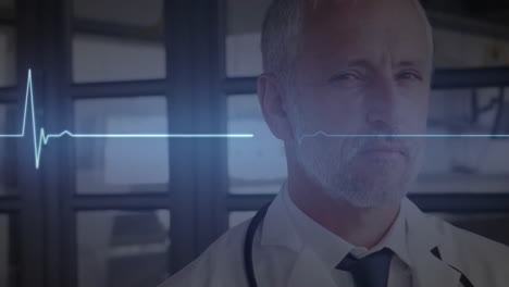 animation of cardiograph over caucasian male doctor with stethoscope