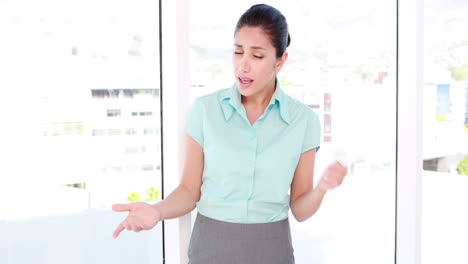 Business-woman-speaking-in-front-of-camera-